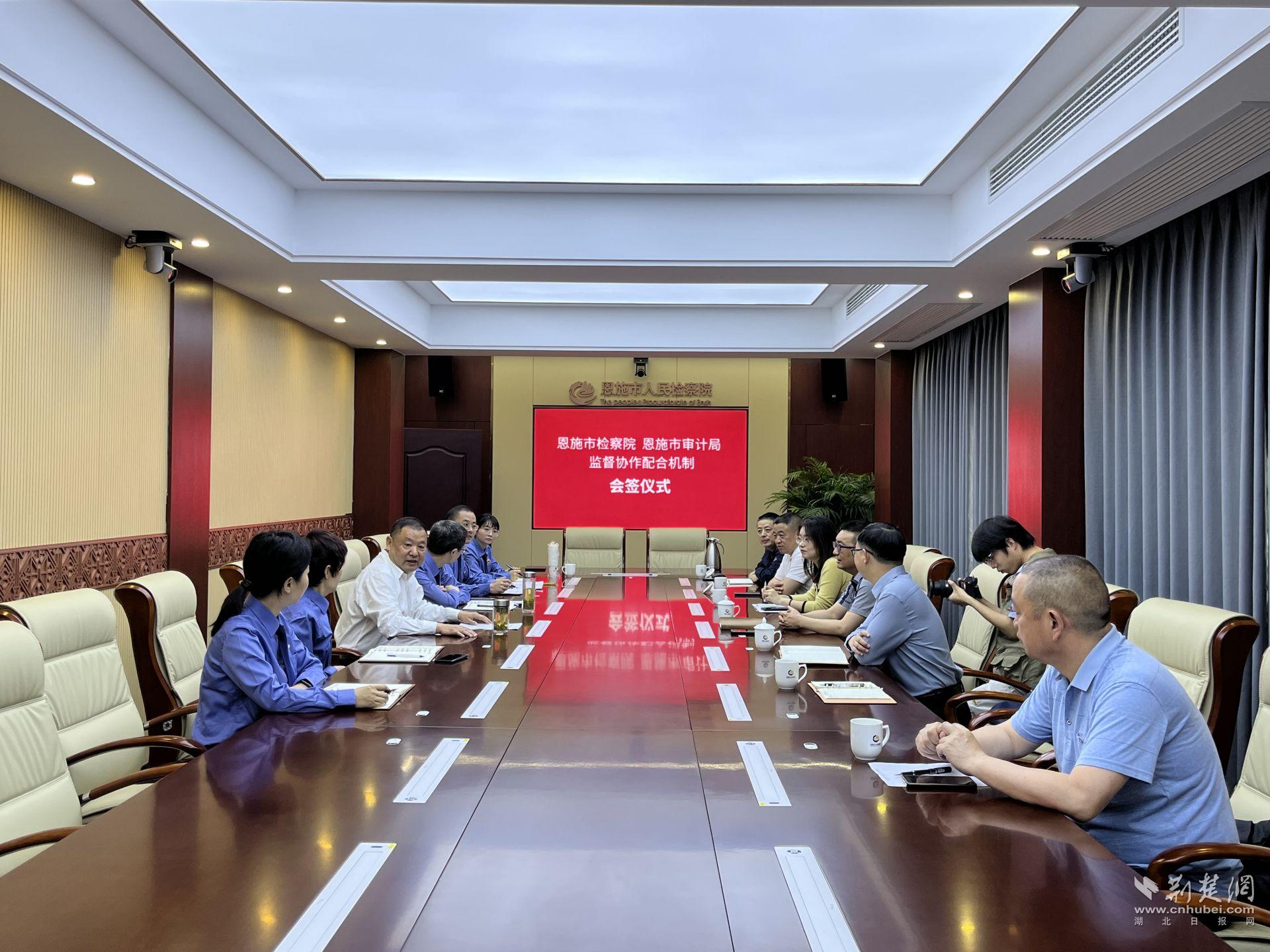 雙方在會簽儀式上就工作機制進行交流.JPG.JPG